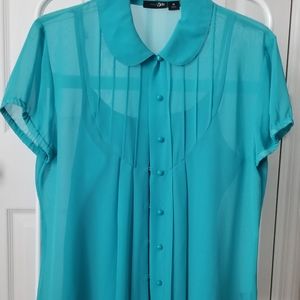 East5th, Light teal blouse.